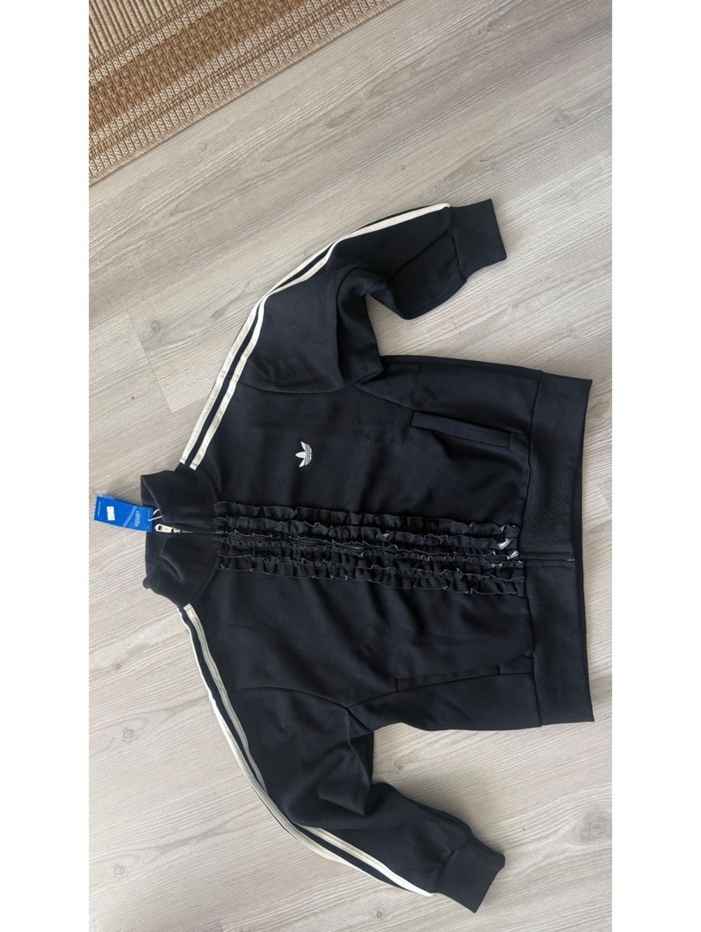 Rare Adidas Originals limited-edition ruffle track jacket in black